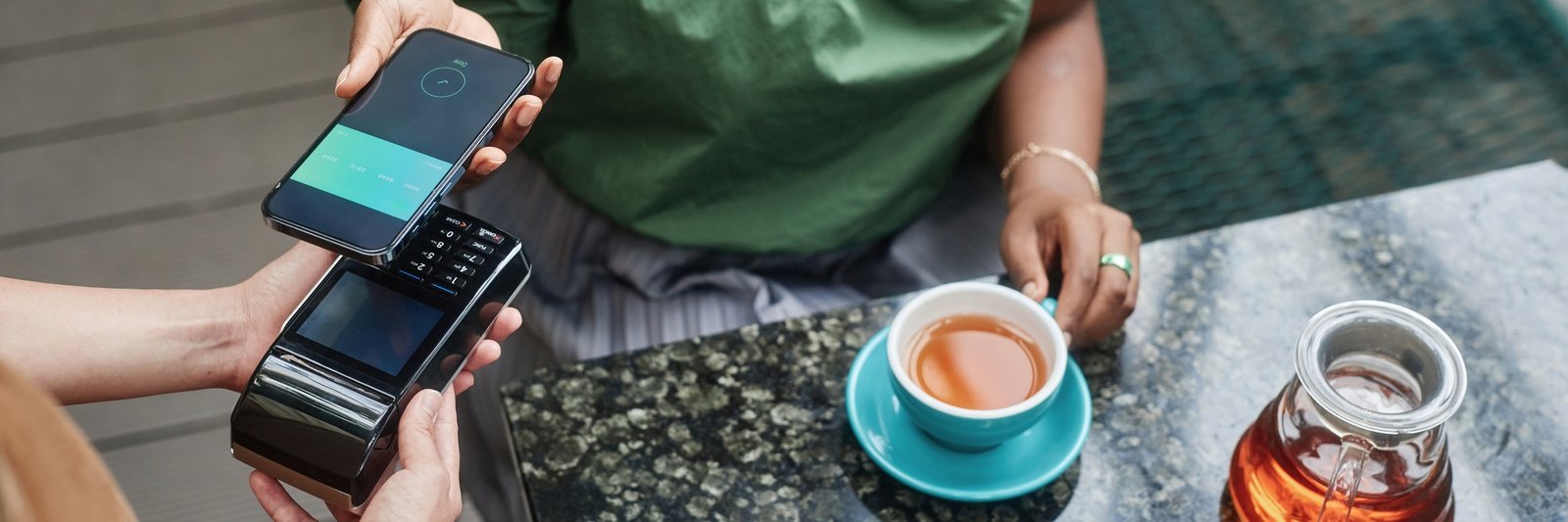 Website Banner of Woman Paying for Order