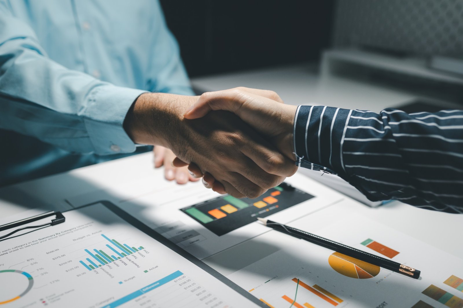 partnership and business people shaking hands in the office for a deal, collaboration or onboarding,