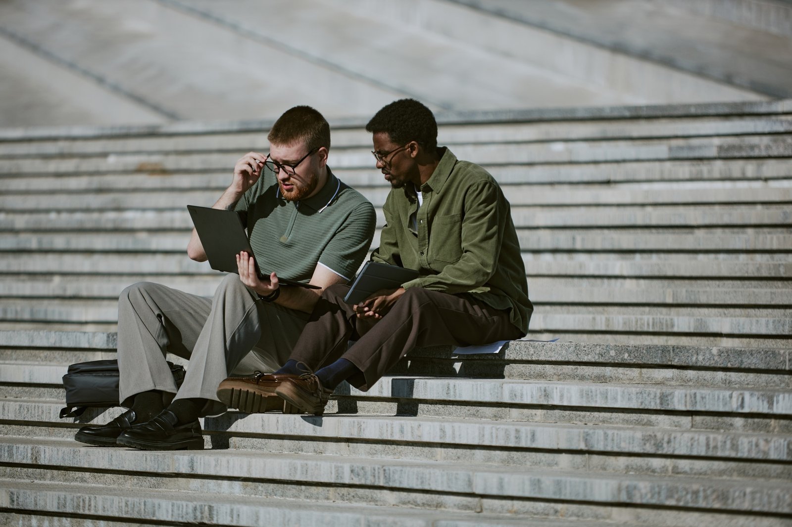 Discussing Work Project on Outdoor Steps